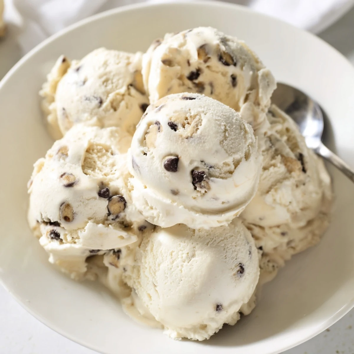 Delicious cottage cheese ice cream with chewy cookie dough chunks, perfect for summer.
