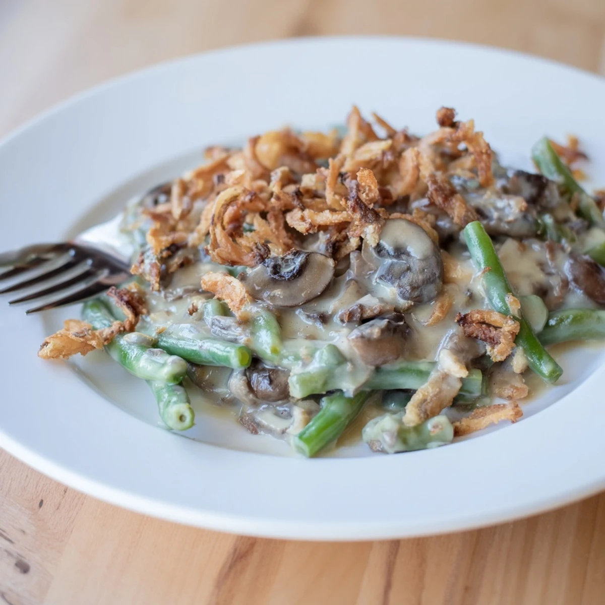 Creamy Old-School Green Bean Casserole baked with crispy onions, a holiday classic.  