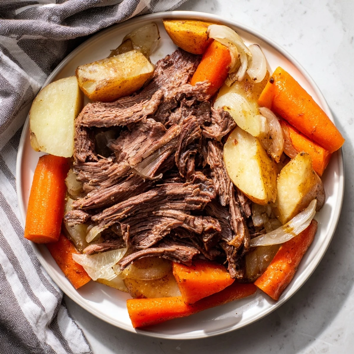 Golden-brown Sunday pot roast, with fall-apart beef, savory pan juices, and mixed roasted veggies.