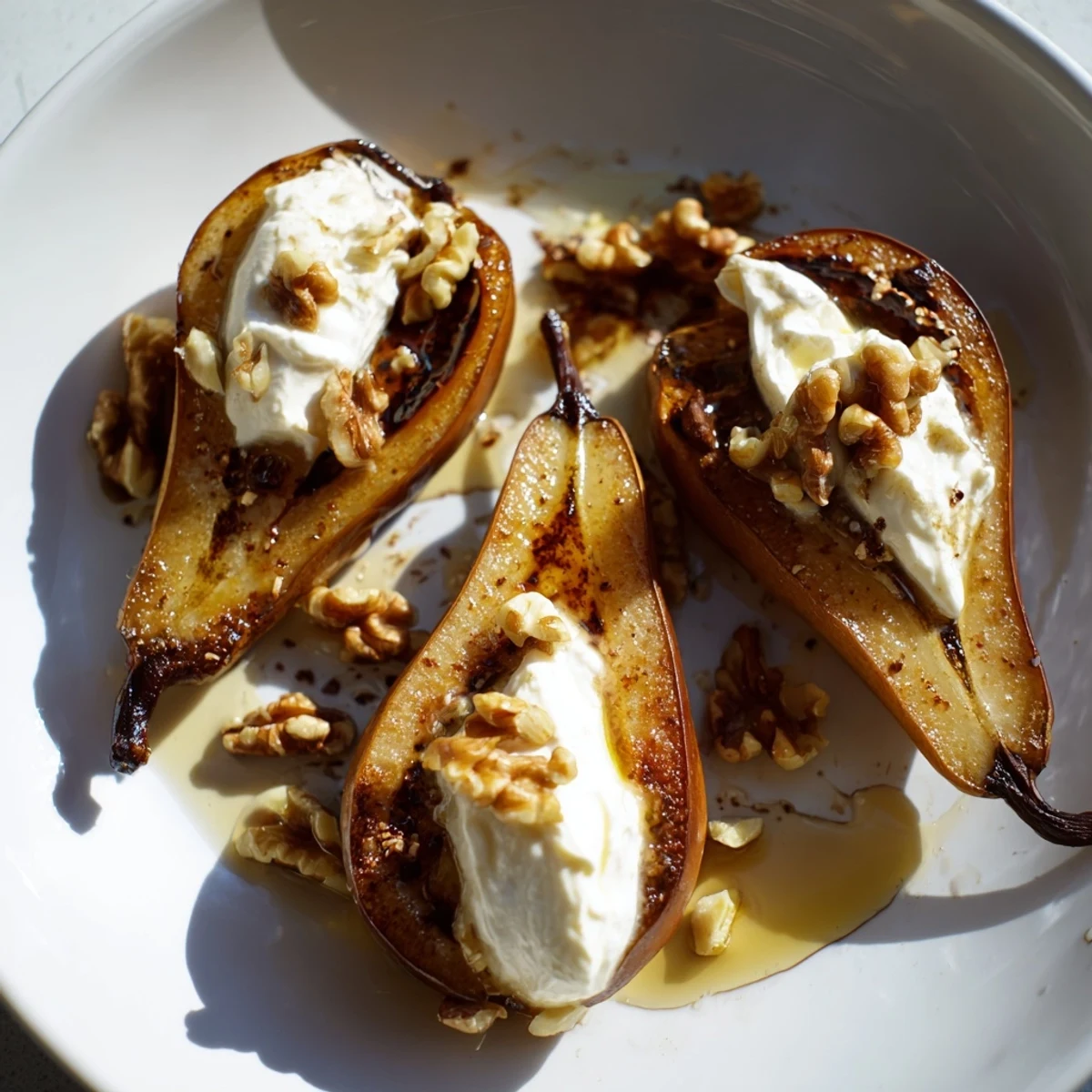 Close-up of baked roasted pears with cinnamon, walnuts, and Greek yogurt—a beautiful, healthy dessert in bowls.