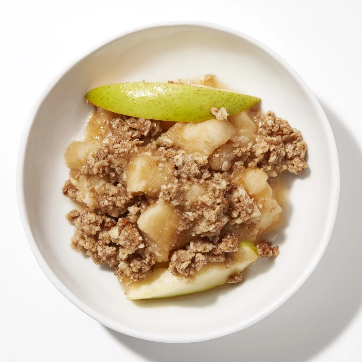 Golden brown, bubbly Best Apple Crisp with a crispy oat topping, perfect for a cozy dessert.