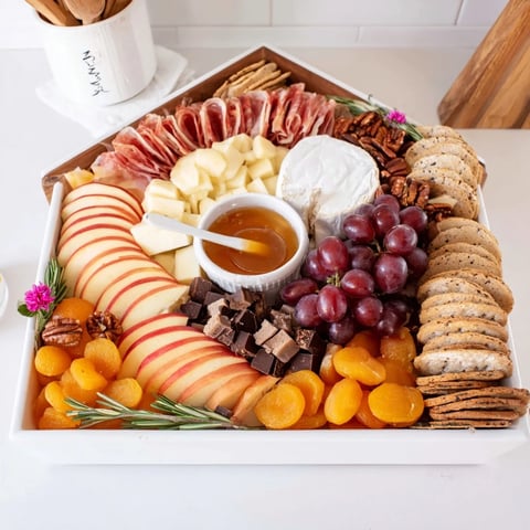 Sweet Home Charcuterie Board brimming with cheeses, fruits, and meats, perfect for sharing and easy to make.