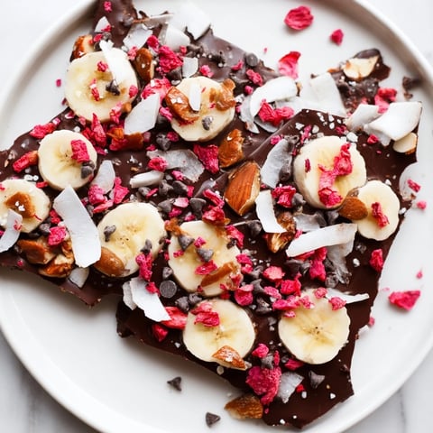 Frozen Chocolate Banana Bark with crunchy toppings, a perfect summer dessert ready to enjoy.