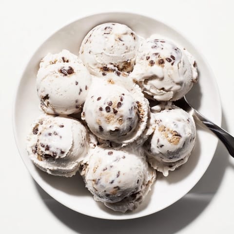 Guilt-free cottage cheese ice cream topped with rich chocolate chip cookie dough.  
