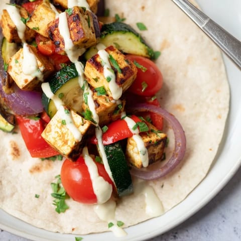 Satisfying plant-based Vegan Viral Recipe re-make served in whole wheat wraps.  