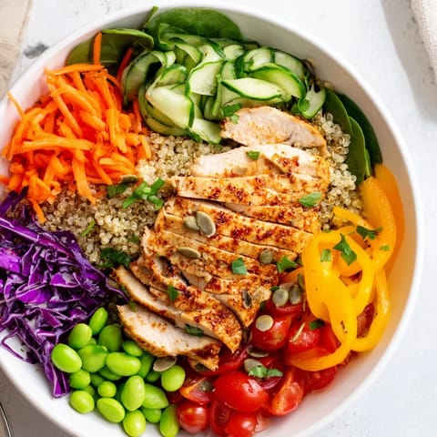 Deliciously layered Healthy Meal-Prep Bowls drizzled with tangy lemon dressing and seeds.  